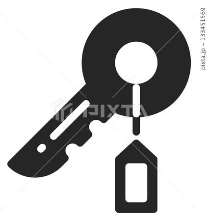A key with a tag hanging from it A key with a tag hanging from it 133451569