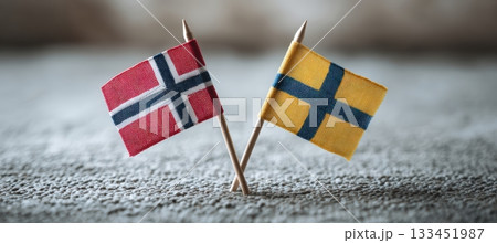 Miniature Norway and Sweden Flags on Textured Fabric in Scandinavian Décor Miniature Norway and Sweden Flags on Textured Fabric in Scandinavian Décor 133451987