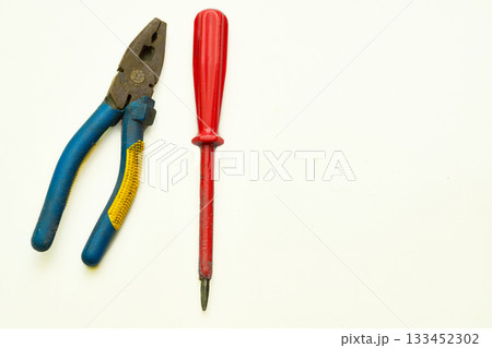 Old rusty pliers,screwdriver from the home shed for repair 133452302