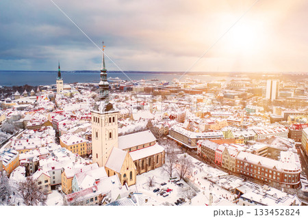 Aerial View of Tallinn in winter, roofs are covered with snow, Christmas mood 133452824