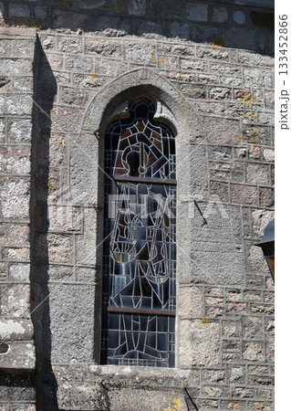 Old vertical window in castle. 133452866