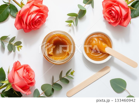 Natural sugaring paste for hair removal with pink roses and eucalyptus leaves Natural sugaring paste for hair removal with pink roses and eucalyptus leaves 133460942