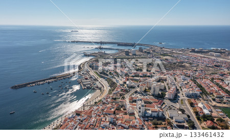sines portugal. coastal evening scenery, sunset over sines shoreline, twilight casts golden hues on coastal landscape, serene seaside view with shimmering waters sines portugal. coastal evening scenery, sunset over sines shoreline, twilight casts golden hues on coastal landscape, serene seaside view with shimmering waters 133461432