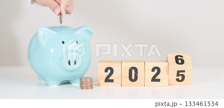 2025 end year to Happy New Year 2026 with piggy bank. Resolution, Goals, Plan, Action, Money Saving, Retirement fund, Pension, Investment and Financial concepts 2025 end year to Happy New Year 2026 with piggy bank. Resolution, Goals, Plan, Action, Money Saving, Retirement fund, Pension, Investment and Financial concepts 133461534