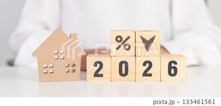 2026 New Year with percentage change to UP and Down arrow with Home model. Real estate Mortgage, Refinance, House loan and debt, Interest rate, Insurance, Financial and Property Tax 133461561