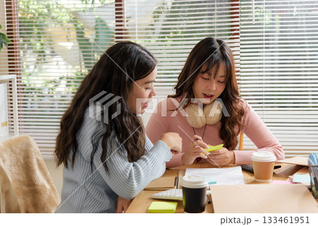Busy meet people office financial work consult team business, young women collaborate sharing ideas, planning project strategy, discussing important data, reviewing documents, showing focused effort. Busy meet people office financial work consult team business, young women collaborate sharing ideas, planning project strategy, discussing important data, reviewing documents, showing focused effort. 133461951