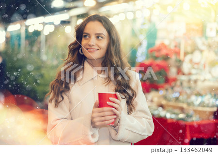 Woman at Christmas market Woman at Christmas market 133462049