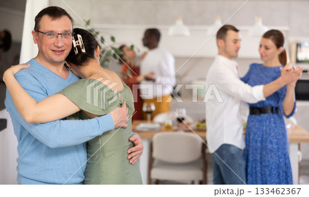 Couples of men and women dancing slow dance Couples of men and women dancing slow dance 133462367