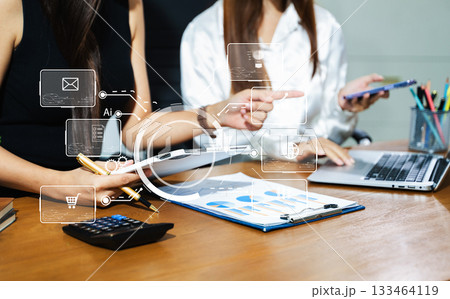 Working team meeting concept, business using laptop and smart phone and digital tablet computer with digital marketing media  in virtual icon network diagram office 133464119