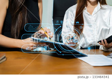 Business team working virtual modern smartphone to reduce CO2 emissions carbon footprint climate change to limit global warming.Sustainable development and green business concept. Business team working virtual modern smartphone to reduce CO2 emissions carbon footprint climate change to limit global warming.Sustainable development and green business concept. 133464341