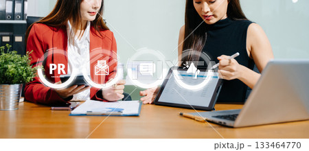 PR, Public relations concept. hands using laptop and tablet with public relations icon for communication advertising marketing strategy. with Ads and sales 133464770