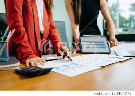 Business team meeting. professional investor working new start up project. Finance task. with smart phone and laptop and digital tablet Business team meeting. professional investor working new start up project. Finance task. with smart phone and laptop and digital tablet 133464772