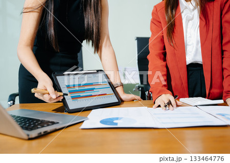 Business team meeting. professional investor working new start up project. Finance task. with smart phone and laptop and digital tablet Business team meeting. professional investor working new start up project. Finance task. with smart phone and laptop and digital tablet 133464776