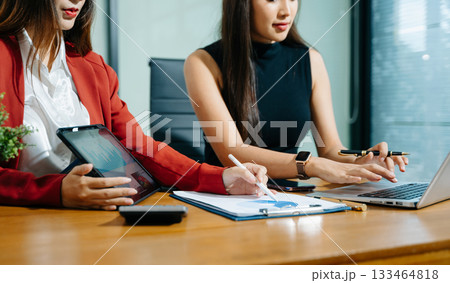Business team meeting present.professional investor working with  Finance managers task. with laptop smart phone and digital tablet 133464818