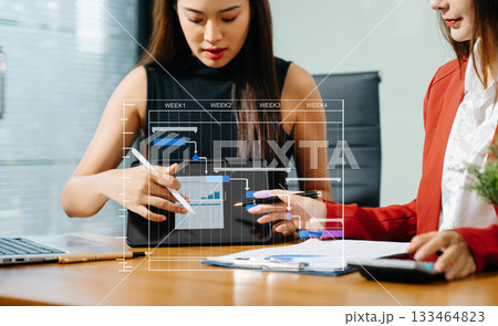 Project manager working and update tasks with milestones progress planning and Gantt chart scheduling diagram.business tram working 133464823