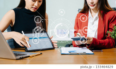 Working team meeting concept, business using laptop and smart phone and digital tablet computer with digital marketing media  in virtual icon network diagram office 133464829