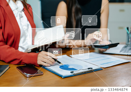 Working team meeting concept, business using laptop and smart phone and digital tablet computer with digital marketing media in virtual icon network diagram office Working team meeting concept, business using laptop and smart phone and digital tablet computer with digital marketing media in virtual icon network diagram office 133464874