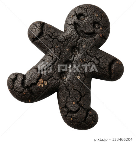 Smiling burnt gingerbread man cookie, funny overcooked baking failure and kitchen disaster with charcoal texture 133466204