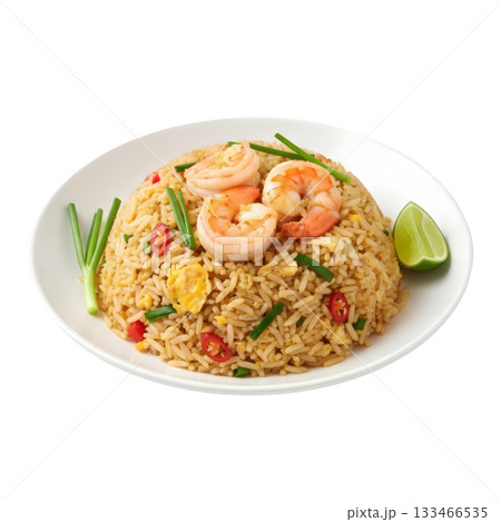 Delicious Thai fried rice dish with prawn, egg, and scallion. savory and appetizing meal served with fresh lime Delicious Thai fried rice dish with prawn, egg, and scallion. savory and appetizing meal served with fresh lime 133466535