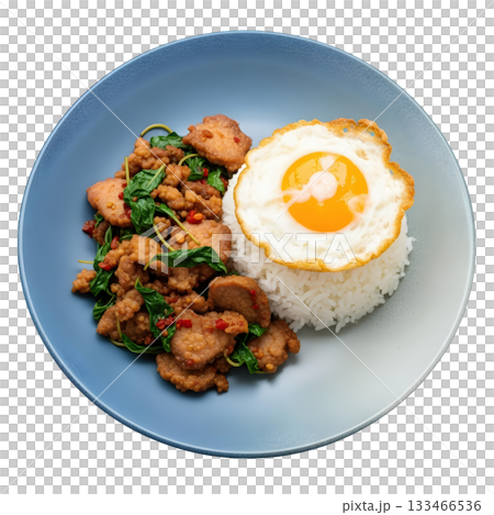 Delicious Thai basil pork stir fry with white rice and fried egg. savory traditional Asian meal on plate Delicious Thai basil pork stir fry with white rice and fried egg. savory traditional Asian meal on plate 133466536