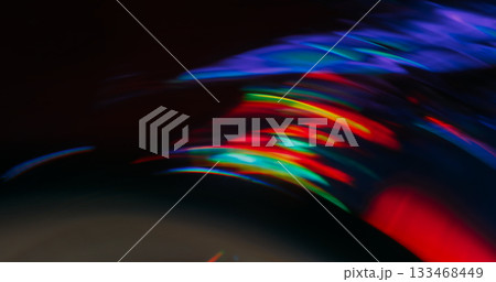 Flare swirl blur. Round glow. Blue green red light circle flow on abstract background. Bright color flash arch on black free space. Flare swirl blur. Round glow. Blue green red light circle flow on abstract background. Bright color flash arch on black free space. 133468449