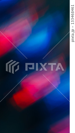 Neon bokeh glow. Ray leak. Bright red blue prism color sparks twinkle mix. Illuminated abstract art shimmering on black background. 133468461