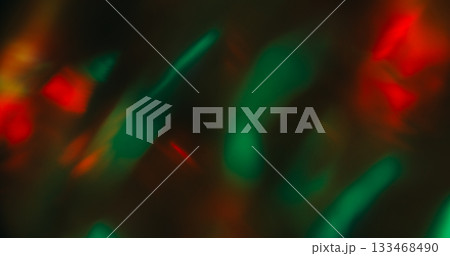 Flash leak blur. Retro flare. Bright green red flame burn film dark black background. Abstract color aged prism luminosity texture. 133468490