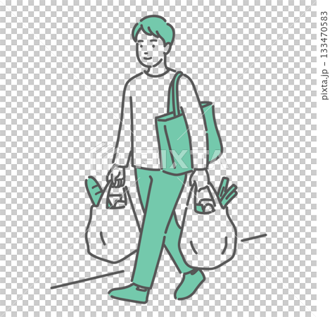 一位年輕男子雙手提著購物袋行走 一位年輕男子雙手提著購物袋行走 133470583