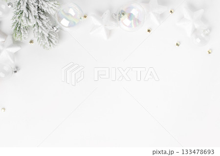 Festive Christmas ornaments on a white background. 133478693