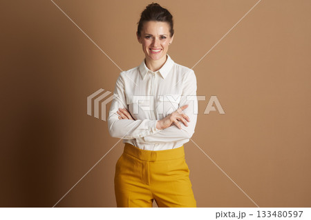 Empowered Businesswoman with Crossed Arms 133480597