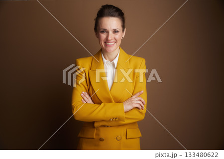 Confident Businesswoman with Crossed Arms 133480622