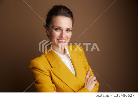 Smiling Business Professional with Arms Crossed Smiling Business Professional with Arms Crossed 133480627