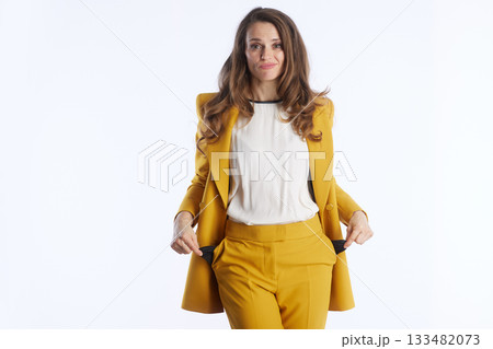 Professional Woman with Empty Pockets and Concern 133482073
