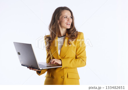 Businesswoman Actively Typing on Laptop 133482651