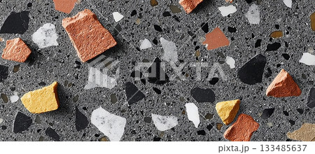 Vibrant Terrazzo Flooring Featuring Colorful Mosaic Stones and Gray Concrete Texture for Interiors 133485637