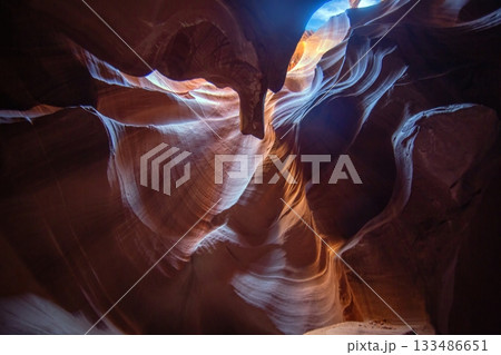 Antelope Canyon light opening in sandstone 133486651