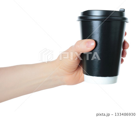 Hand holding a black kraft coffee cup. Clean studio lighting, texture, isolated on transparent background. Perfect for branding, packaging, and advertising use Hand holding a black kraft coffee cup. Clean studio lighting, texture, isolated on transparent background. Perfect for branding, packaging, and advertising use 133486930