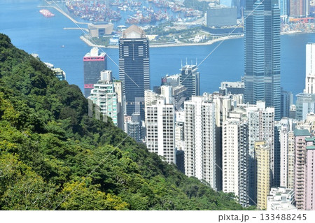 The view of Hong Kong cityscape from the Peak of Hong Kong. Beautiful and stunning view of Hong Kong. Hong Kong Cityscape and skyline. The view of Hong Kong cityscape from the Peak of Hong Kong. Beautiful and stunning view of Hong Kong. Hong Kong Cityscape and skyline. 133488245