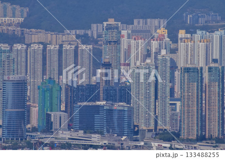 The view of Hong Kong cityscape from the Peak of Hong Kong. Beautiful and stunning view of Hong Kong. Hong Kong Cityscape and skyline.  133488255
