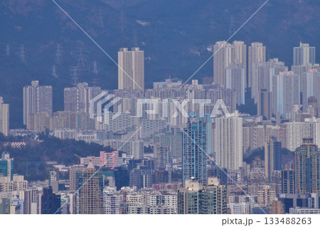The view of Hong Kong cityscape from the Peak of Hong Kong. Beautiful and stunning view of Hong Kong. Hong Kong Cityscape and skyline.  133488263