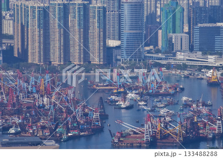The view of Hong Kong cityscape from the Peak of Hong Kong. Beautiful and stunning view of Hong Kong. Hong Kong Cityscape and skyline. The view of Hong Kong cityscape from the Peak of Hong Kong. Beautiful and stunning view of Hong Kong. Hong Kong Cityscape and skyline. 133488288