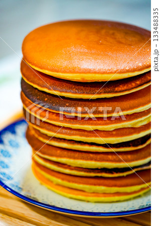 Freshly tasty stack of pancakes on the plate. Delicious homemade breakfast 133488335