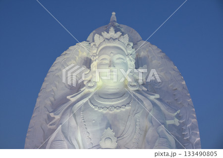 A large Buddhist sculpture made entirely of snow and ice in northen China A large Buddhist sculpture made entirely of snow and ice in northen China 133490805