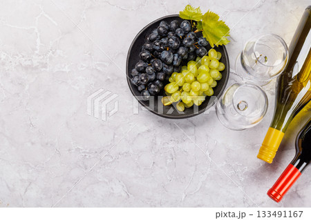 Wine bottles and fresh grapes 133491167