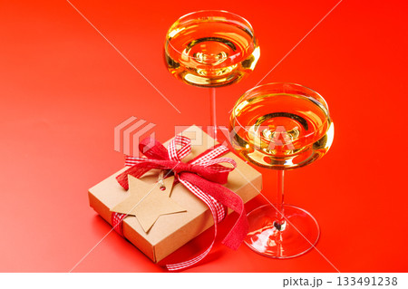 Champagne glasses and gift box 133491238