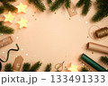 Christmas frame with star candles, fir branches, gift tags, and wrapping supplies on beige background. Copy space for text or design. 133491333