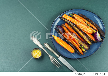 Vegetarian healthy food, baked carrots. Vegetarian healthy food, baked carrots. 133491581