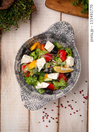 Fresh greek salad with feta and olives Fresh greek salad with feta and olives 133491770