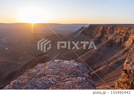 Sunset over fish river canyon 133492442