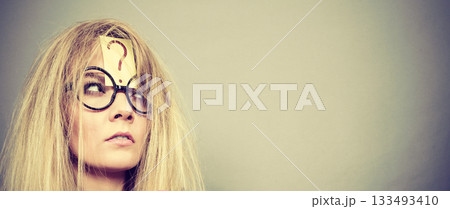 Tired crazy woman after intensive thinking Tired crazy woman after intensive thinking 133493410
